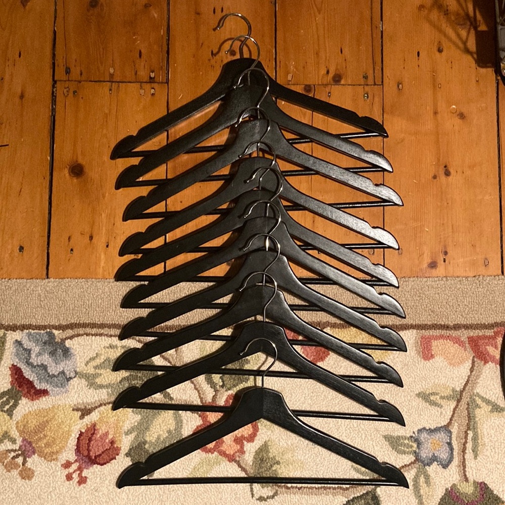 Set of 10 painted wooden clothes hangers in excellent condition